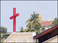 Christianity and Buddhism share the skyline in Sihanoukville - from BBC website