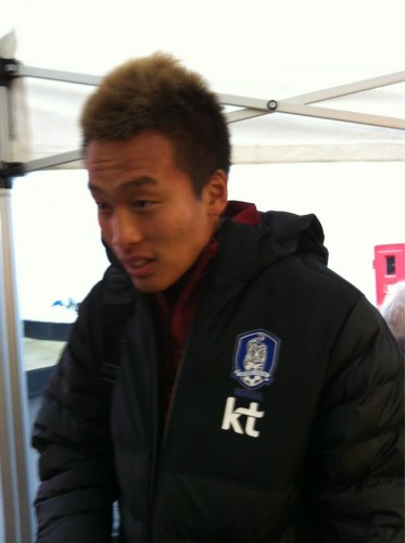 Kim Shin-wook at the mixed zone