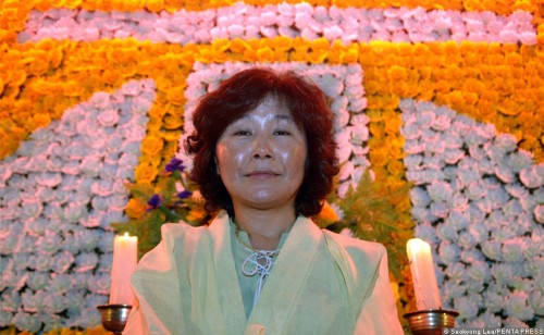 Before they are buried, participants are asked to pose for their funeral portrait