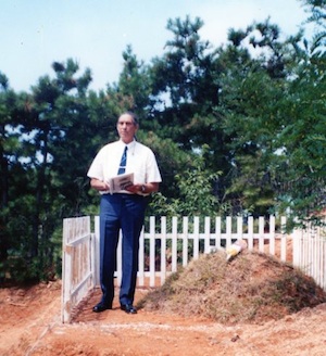 Flt Lt Desmond Hinton's brother David visits his grave