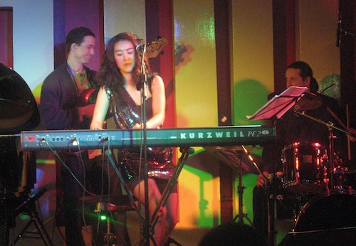Younee with band at the 100 Club