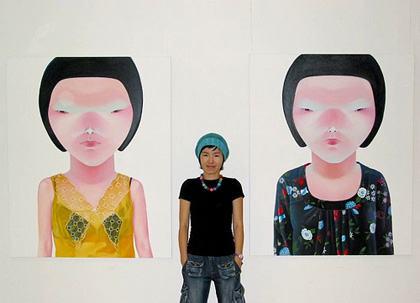 Lee So-yeun poses with two self portraits Lee So-yeun poses with two self portraits