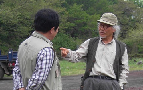 Mr Baek Un-cheol, honorary director of Jeju Stone Park (right) with Mr Kim Yu-jeong, writer and critic