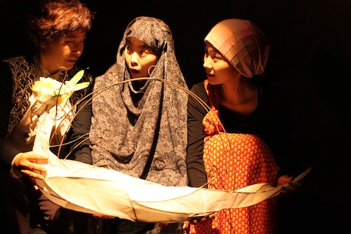 Gaksi and her Middle Eastern friends travel home in a magic airship provided by Mago