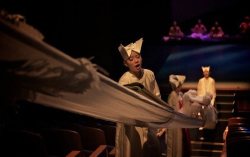 Shamans pass through the audience