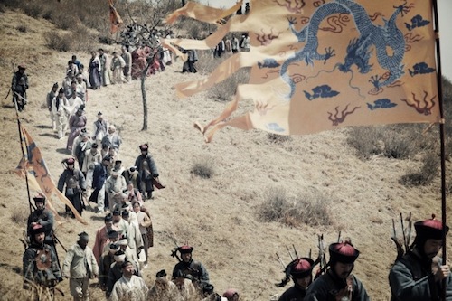 Korean prisoners are herded towards the Manchurian border