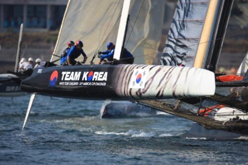 Team Korea show off their tiger-stripe design