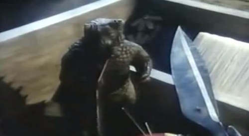 The baby Pulgasari eats his way through the sewing box