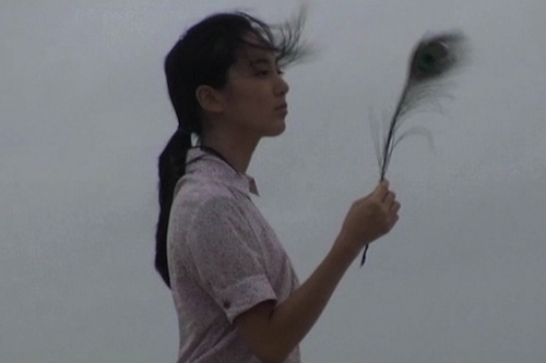 So-yeon with her peacock feather