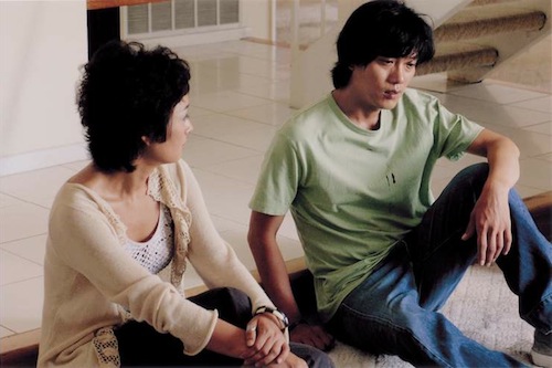Ji-seok and Sunny in a quiet conversation at Sunny's house