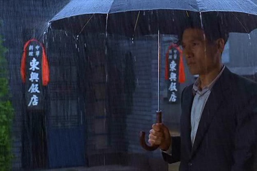 Ahn Sung-ki as the local schoolteacher tries to remain aloof from the ideological battle