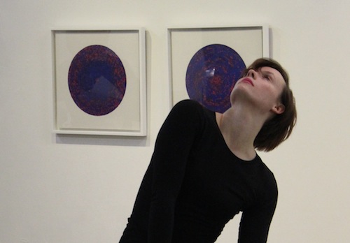 One of the Roehampton University dancers performs in front of Soon Yul Kang's Unity (2012)