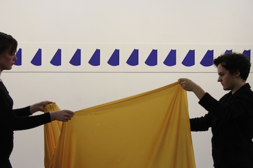 Yellow and Blue - two of Korea's five traditional colours: the dancers perform in front of a work by Bada Song