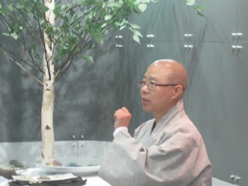 A lady monk at the temple food stall