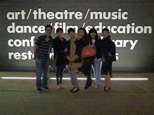 Some of the orchestra members pose for the camera