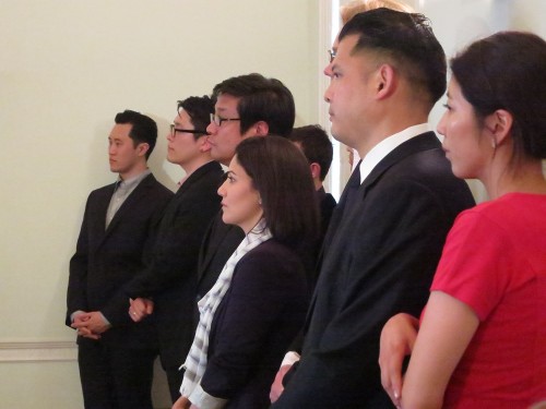 The BBC's Mishal Husain, Curator Stephanie Seungmin Kim and the singers watch the speeches