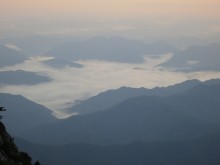 Clouds fill the valleys