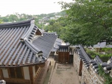 The anchae and its view from the woodland path behind it