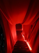 The stairs down to the opium den