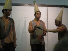 The first appearance of the Brush - a single note is painted for the accordionist to play