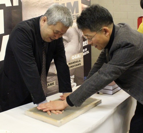 Im Kwon-taek leaves a handprint for the KCC's film archive