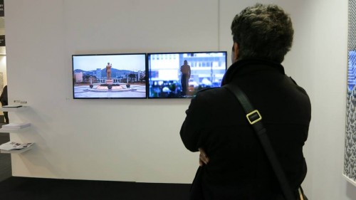 Installation view of two of Mioon's video works 