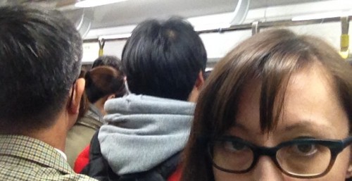 Sora Kim-Russell in a crowded subway