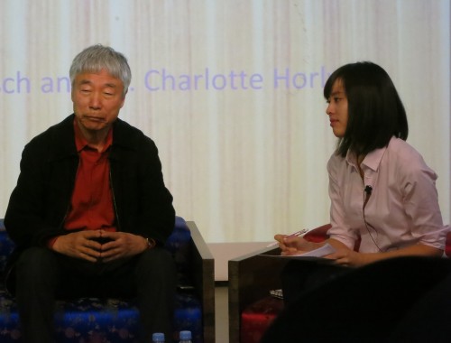 Lee Ufan at the KCC with interpreter Rho Seh-hyun