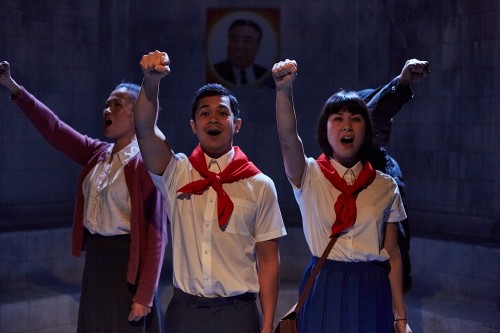 P'yongyang. The ensemble cast proclaim their loyalty to the motherland. Photo Credit Richard Lakos