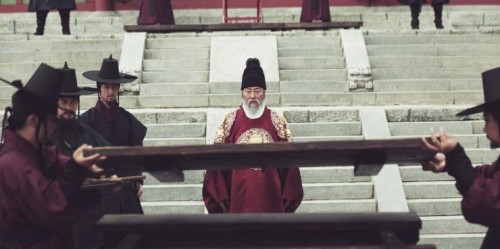 King Yeongjo (Song Kang-ho) looks on as the rice chest is opened