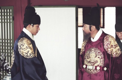 Crown Prince Sado (Yoo Ah-in, left) is berated by his father King Yeongjo.