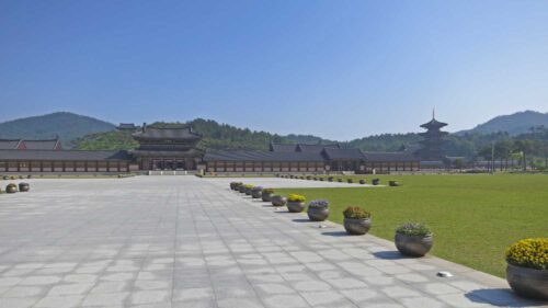 The huge open space inside Sabiseong's main gate: ahead is the palace; to its right, the temple