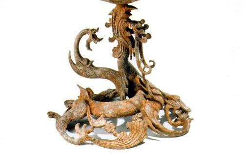 The dragon that supports the incense burner