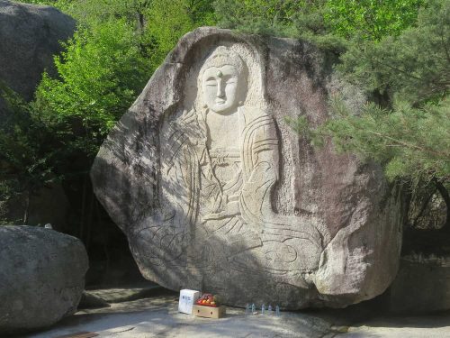 The seated rock-carved buddha at Baekundae, Bongamsa