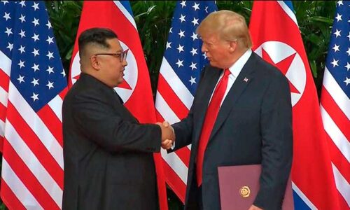 Trump / Kim handshake