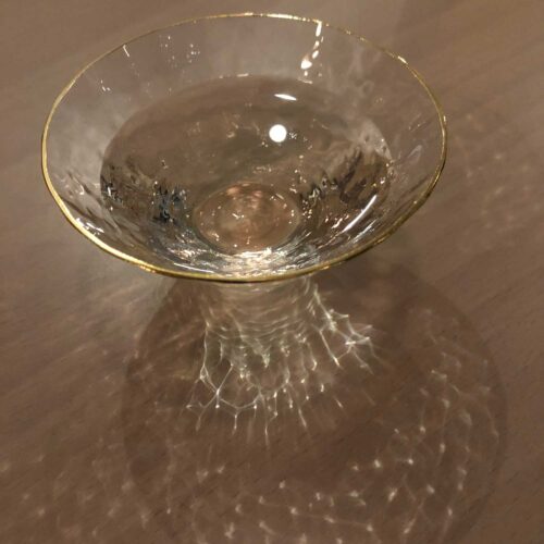 a glass of pine-needle alcohol from Sollip