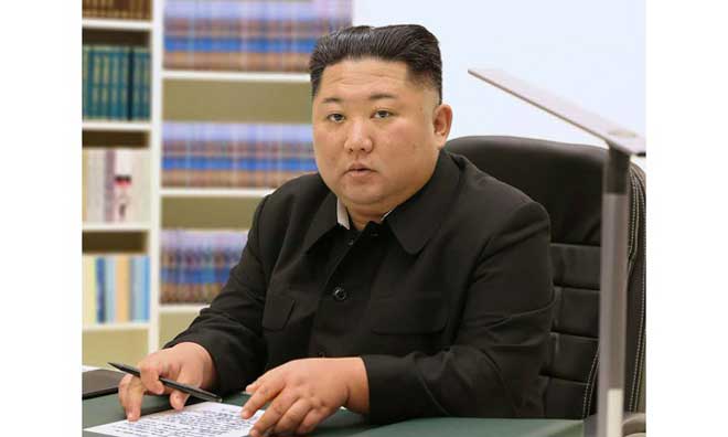 Kim Jong Un with his 2021 New Year letter