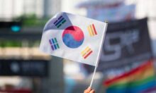 A Korean flag with rainbow trigrams