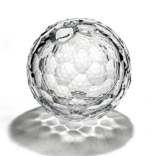 A hollow, hexagonal-faceted glass globe